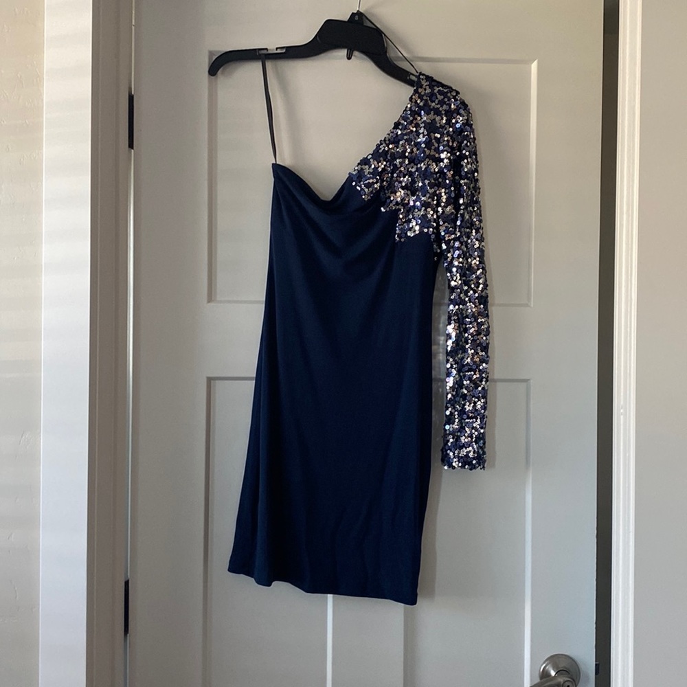 This is a Jodi Kristopher dress, one sleeve, size small, navy blue, form fitting